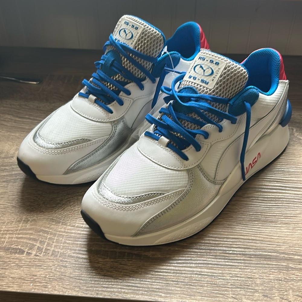 Men’s 10.5 Puma NASA sneakers.